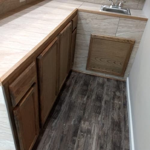 Screened porch addition with ceiling fan